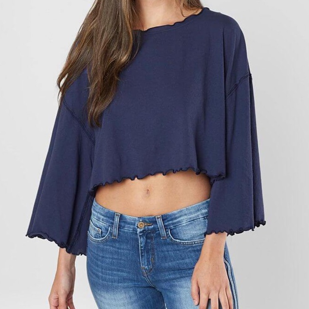 NWT Free People dark blue ruffle top